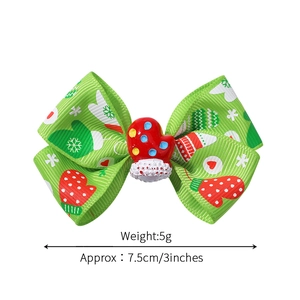 Christmas bow hair clip with green snowflake pattern and red heart, 3 inches wide