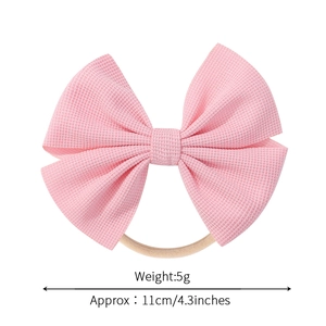 Pink waffle bow headband with soft elastic nylon band for baby girls 4.3 inches