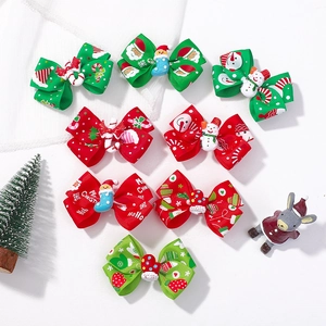 8-piece Christmas bow hair clip set with Santa and snowman resin charms for kids