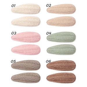 Detailed set of 12 knitted teardrop hair clips in multiple candy colors for girls
