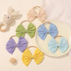 Set of 6 colorful waffle fabric baby bow headbands with soft seamless nylon bands