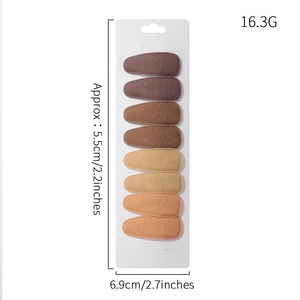 Set of 8 matte fabric snap hair clips in earth tones on display card with dimensions