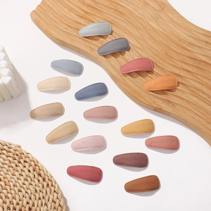 Set of 15 colorful fabric covered teardrop hair clips in elegant Morandi color tones
