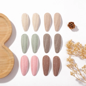 Set of 12 knit texture snap hair clips in assorted candy colors for girls and women