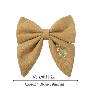 Nœud à cheveux en coton et lin gingembre fait main avec broderie marguerite pour filles