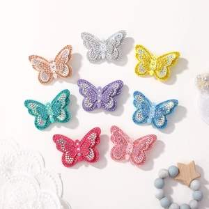 Lot de huit pinces à cheveux papillon colorées et scintillantes en strass pour filles