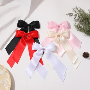 Set of five large satin ribbon bow hair clips in assorted macaron and classic colors