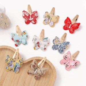8-piece set of butterfly hair clips with floral prints and faux pearls for girls