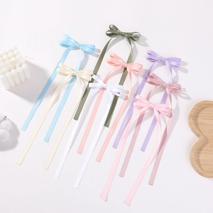 Elegant long tassel satin bow hair clips in assorted macaron colors for girls