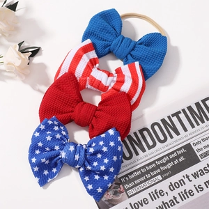 Detail of waffle knit baby headbands with red white and blue patriotic star stripes