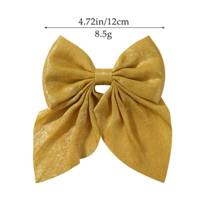 Grande fiocco per capelli dorato glitterato per ragazze con larghezza 12cm e seta elegante