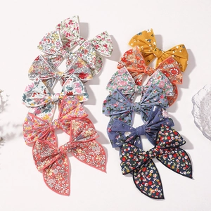 Lot de 10 barrettes à nœuds en coton fleuri avec rubans longs en couleurs pastel variées