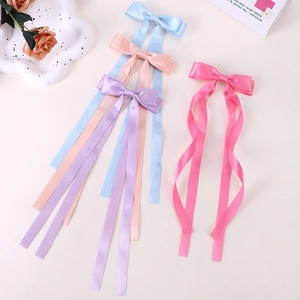 Cute double-layered satin bow hair clips with long ribbons in four pastel colors for girls
