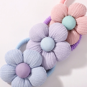 Set of three cute linen sunflower hair ties for girls in pastel blue purple and pink