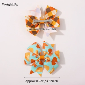 Detail showing dimensions of autumn pumpkin maple leaf bows and metal clips for hair