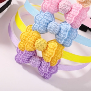 Colorful macaron style fabric bow headbands for girls in pink yellow blue and purple