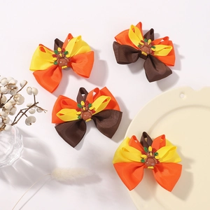 Set of four Thanksgiving turkey hair bows with ribbed ribbons in warm autumn colors