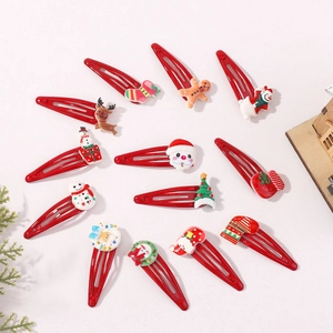 Lot de 12 barrettes de Noël détaillées avec Père Noël et rennes sur pinces rouges