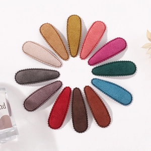Set of 12 colorful velvet teardrop hair clips with scalloped edges for girls
