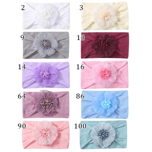 Gamma colori di fasce per neonati in nylon con grandi fiori di tessuto stratificati
