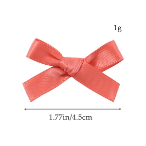 Detail view of 4.5cm pink satin ribbon bow hair clip with size and 1g weight labels