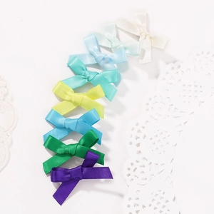 Colorful mini ribbon hair bows for girls in multiple colors for DIY hairstyles