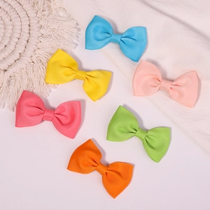 Set of six colorful grosgrain ribbon hair bows for girls in various vibrant shades
