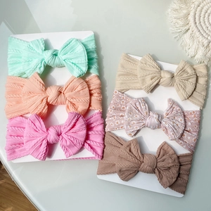 Lot de 6 bandeaux bébé avec nœuds en jacquard aux couleurs variées sur cartes