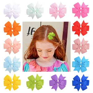 Sélection de 14 barrettes à nœuds en ruban gros-grain coloré pour enfants et bébés