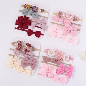 Lot de quatre bandeaux bébé avec nœuds en velours côtelé et fleurs en couleurs pastel douces
