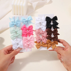 Set of 16 colorful grosgrain ribbon swallowtail bow hair clips for girls in various colors