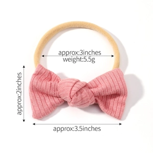 Detailed size specifications for pink ribbed bow headband on soft elastic nylon band