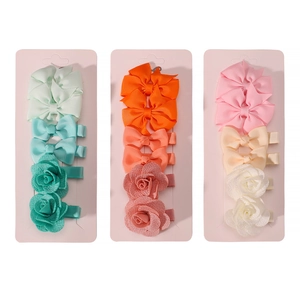 Handmade fabric hair bow and rose clip sets for baby girls in assorted pastel colors