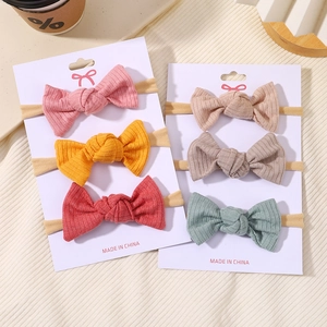 Set of 6 ribbed fabric baby bow headbands with elastic nylon bands in multi colors