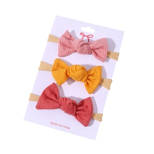 Baby bow headband set with three ribbed fabric bows on elastic nylon bands for girls