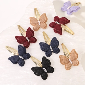 Handmade layered butterfly hair clips with faux pearls and metal duckbill clips