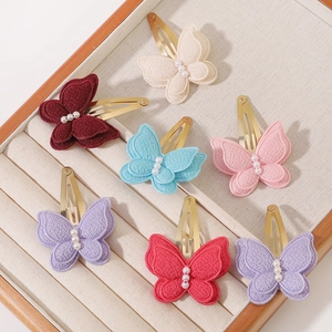 Handmade double-layer fabric butterfly hair clips with shimmering pearls for kids