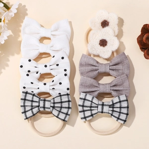 8-piece baby bow headband set featuring polka dots, plaid, and crochet flowers