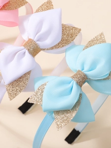 Détail de serre-tête nœud pailleté fait main avec ruban gros-grain pour enfants