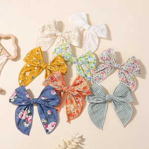 Lot de 7 barrettes à cheveux en coton et lin pour bébé avec motifs floraux et nœuds mignons