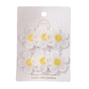 Set of 6 cute embroidered daisy fabric hair clips on white card, handmade style