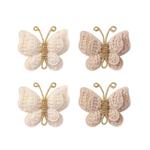 Set of four handmade crochet butterfly hair clips with gold wire in cream white