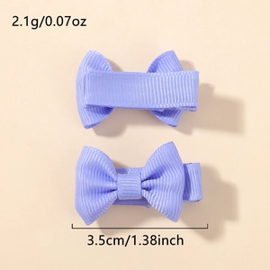 Detail of 3.5cm lilac grosgrain ribbon bow clips showing texture and dimensions
