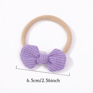 Purple waffle bow headband for babies with high-stretch nylon band, size 6.5cm wide