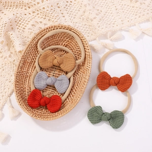 5-pack baby waffle knit bow headbands in caramel, red and green for newborns