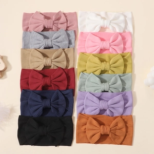 Lot de 12 bandeaux élastiques pour bébé avec grands nœuds en tricot côtelé multicolore