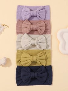 Détail de lot de 5 bandeaux bébé en tissu côtelé avec de grands nœuds doux élastiques
