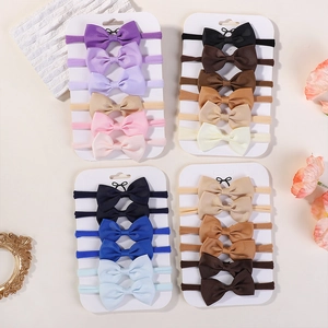 Detailed set of baby bow headbands in various colors on high-elastic nylon bands