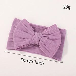 Bandeau bébé violet en nylon souple avec grand nœud en maille torsadée et tissu extensible