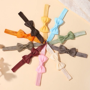 Lot de dix bandeaux à nœuds en gros-grain colorés avec bandes élastiques pour bébés